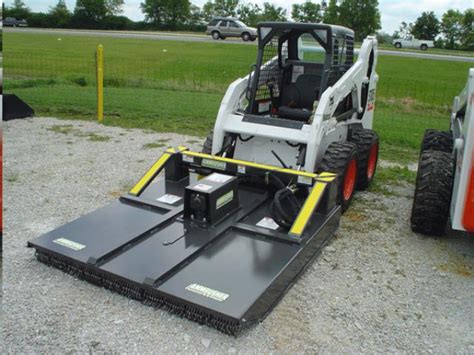 bobcat skid steer with bush hog attachment for rent|skid steer attachment rentals.